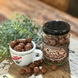 Milk chocolate coated coffee beans in a gourmet confectionary package
